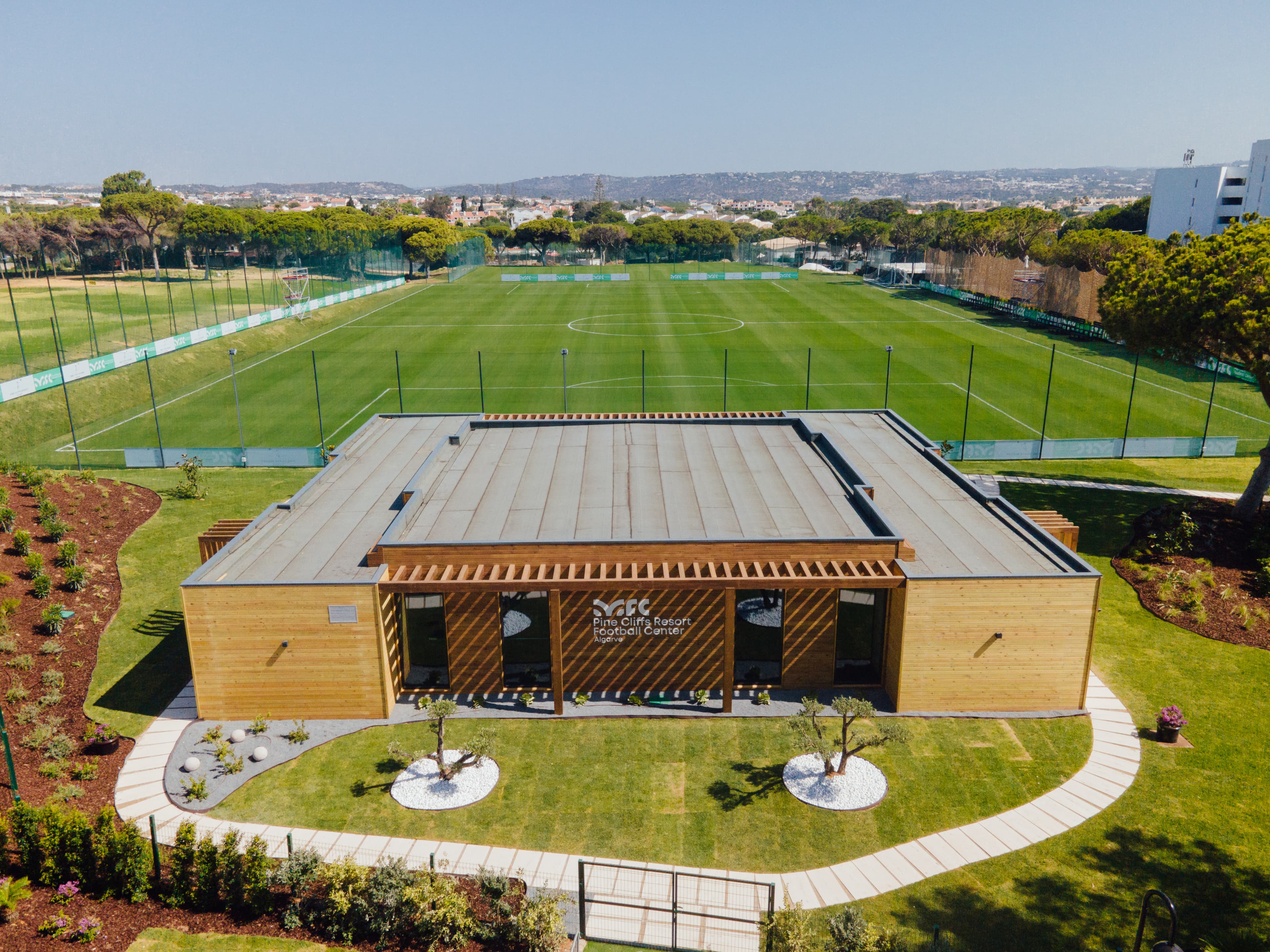 Aerial view of the Pine Cliffs Resort Football Center pitch and clubhouse